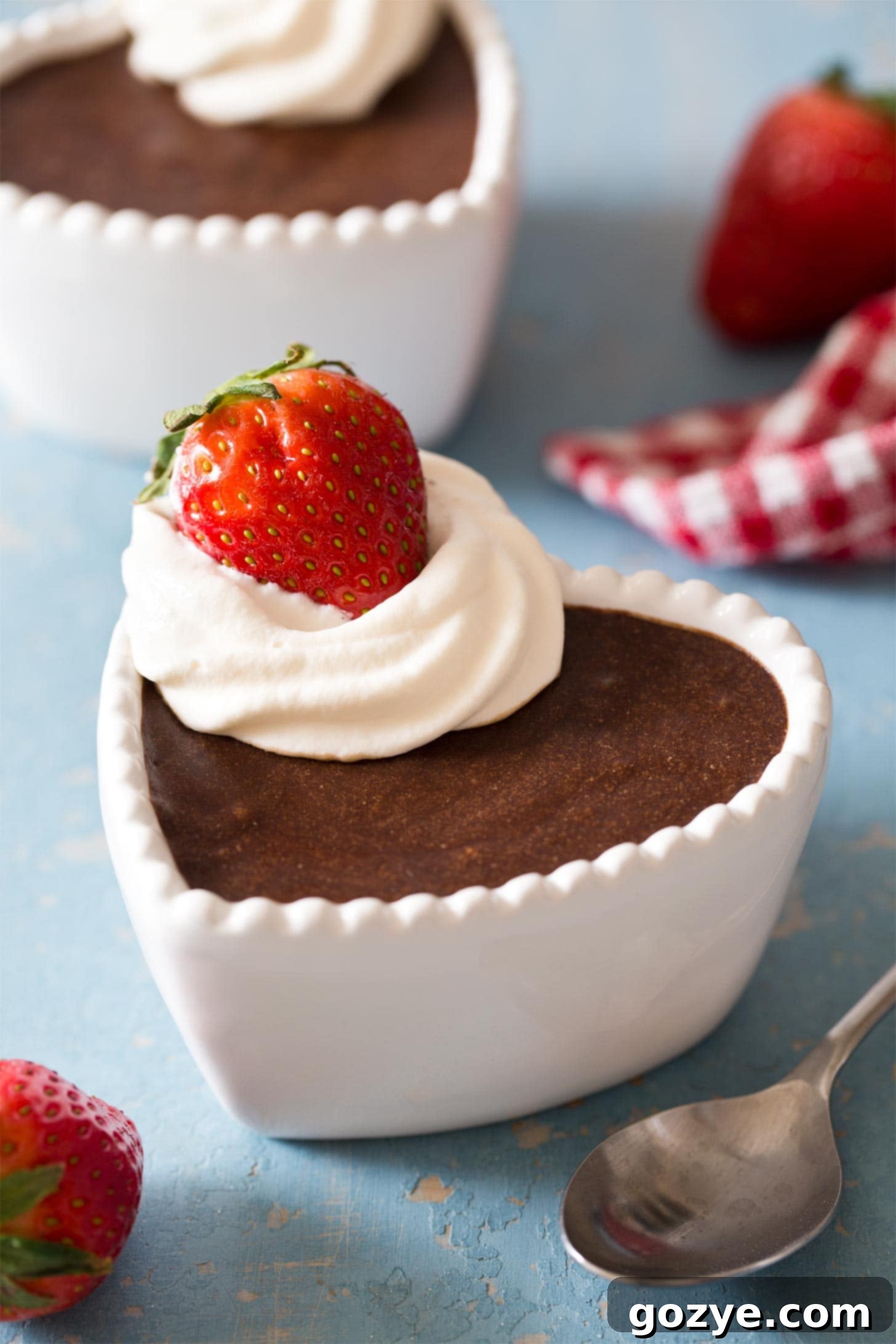 Homemade chocolate mousse served in a heart-shaped ramekin