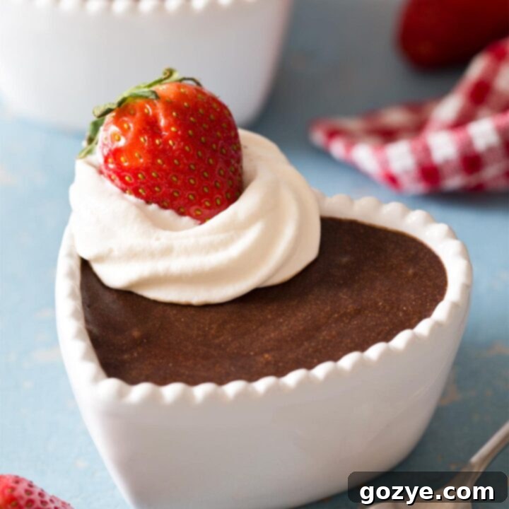 Homemade chocolate mousse in a heart ramekin ready to eat