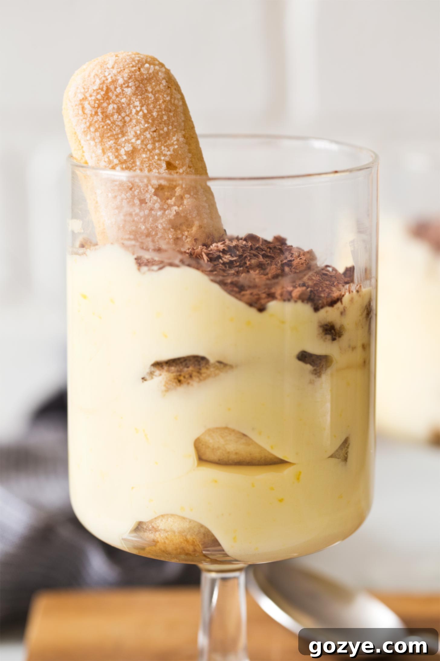 Close up of small batch tiramisu in serving glass