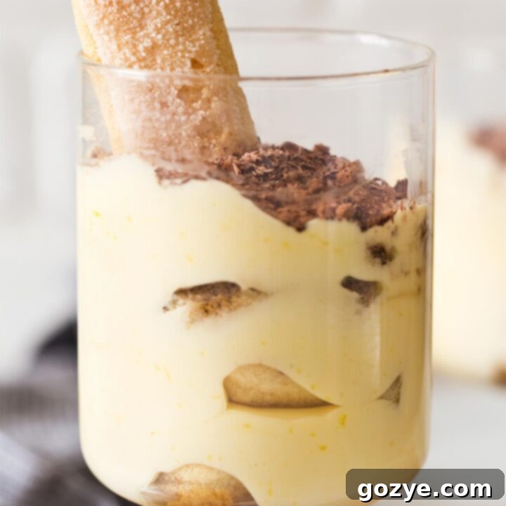 Close up of small batch tiramisu in serving glass