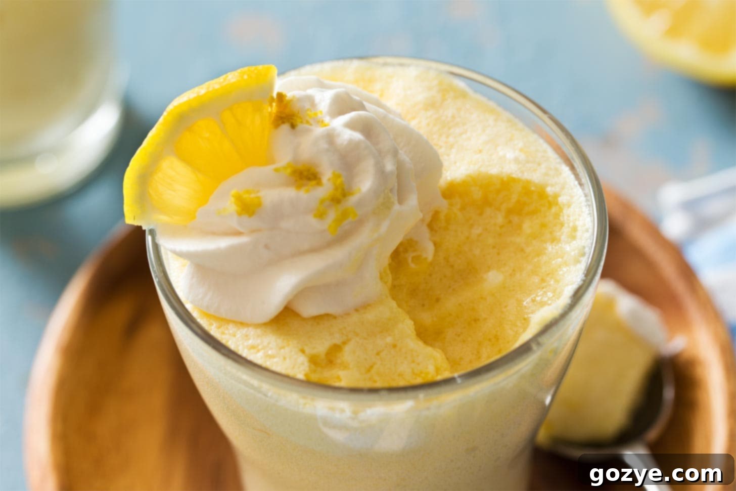 Close up of lemon mousse with bite taken